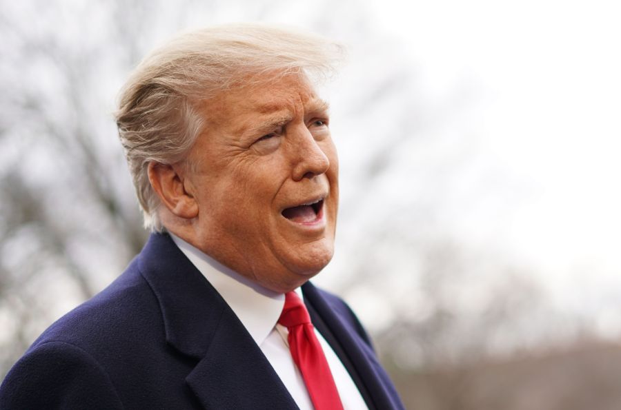 President Donald Trump speaks to the press before boarding Marine One as he departs from the South Lawn of the White House in Washington, DC on March 22, 2019.(Credit: MANDEL NGAN/AFP/Getty Images)