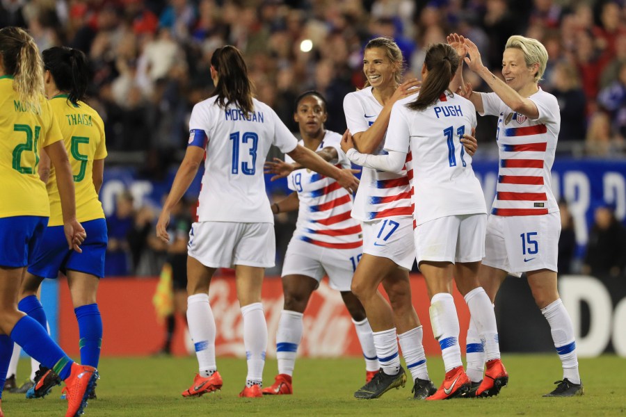 Megan Rapinoe, Mallory Pugh and Alex Morgan celebrate with Tobin Heath after a goal against Brazil in the first half of the "She Believes Cup" at Raymond James Stadium on March 5, 2019, in Tampa, Florida. (Credit: Mike Ehrmann/Getty Images)