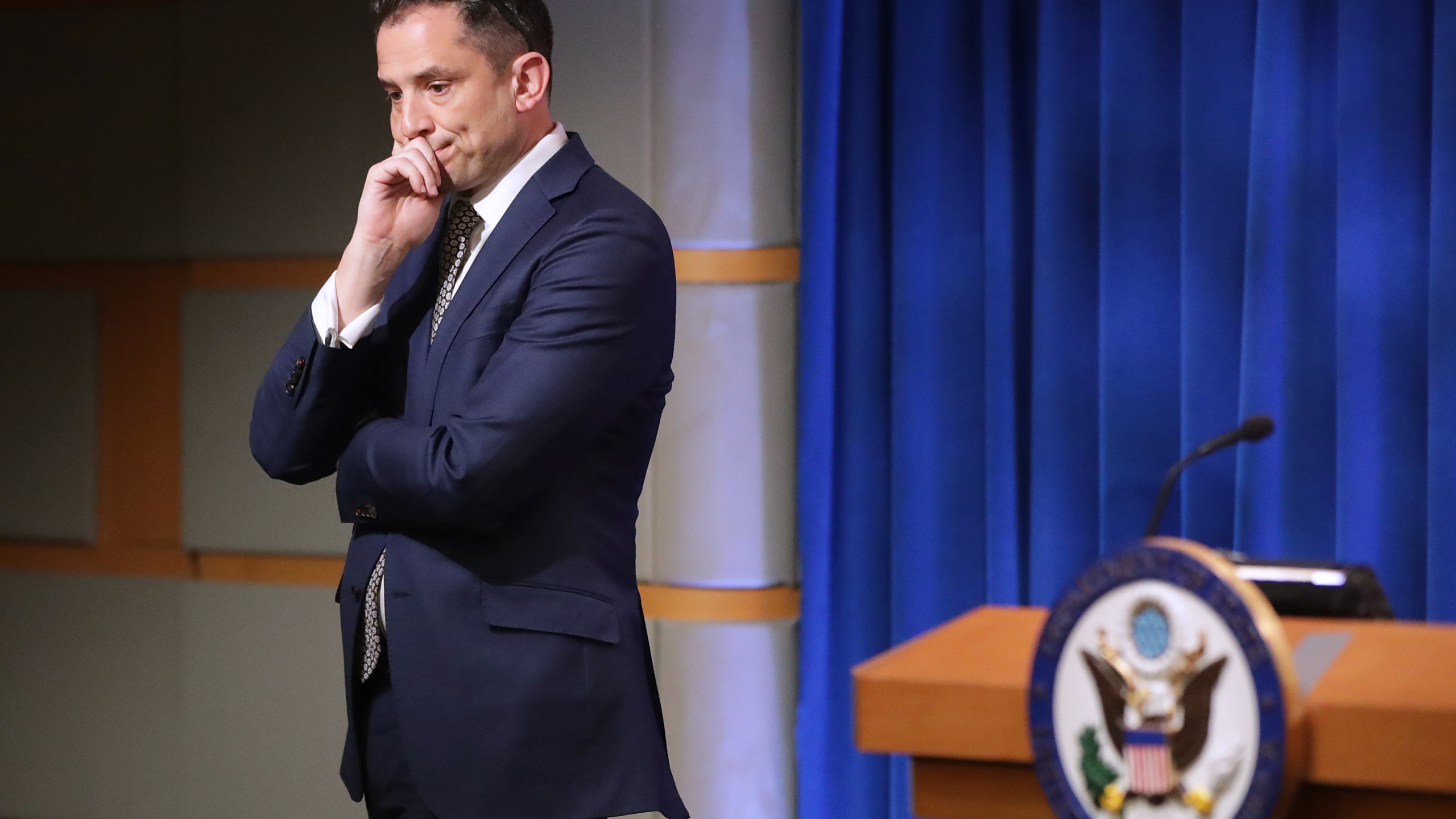 State Department Deputy Spokesperson Robert Palladino helps conduct a new conference with U.S. Secretary of State Mike Pompeo about the dire economic and political situation in Venezuela at the Harry S. Truman State Department headquarters March 11, 2019 in Washington, DC. (Credit: Chip Somodevilla/Getty Images)