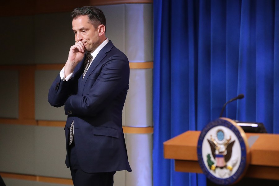 State Department Deputy Spokesperson Robert Palladino helps conduct a new conference with U.S. Secretary of State Mike Pompeo about the dire economic and political situation in Venezuela at the Harry S. Truman State Department headquarters March 11, 2019 in Washington, DC. (Credit: Chip Somodevilla/Getty Images)