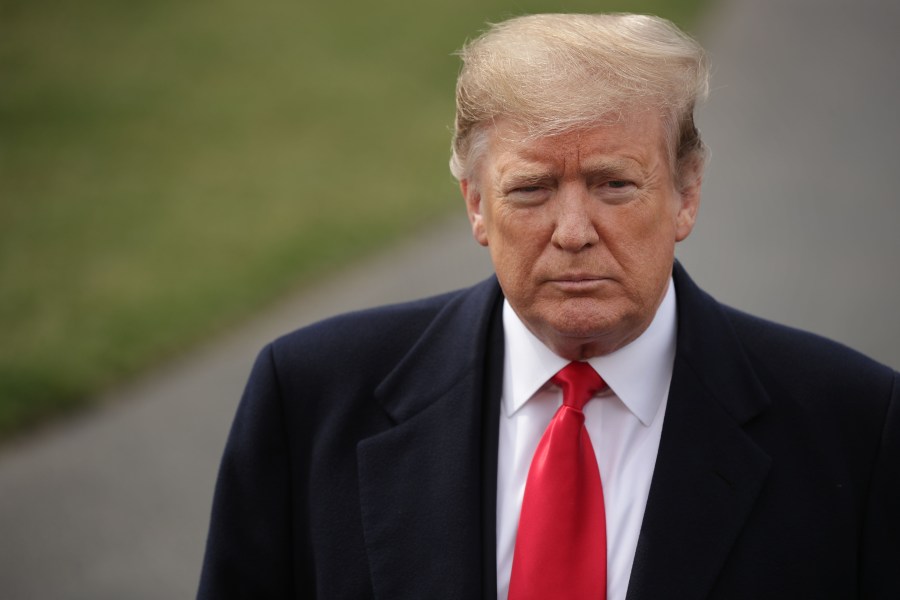 U.S. President Donald Trump talks with journalists before departing the White House on March 20, 2019 in Washington, DC. (Credit: Chip Somodevilla/Getty Images)