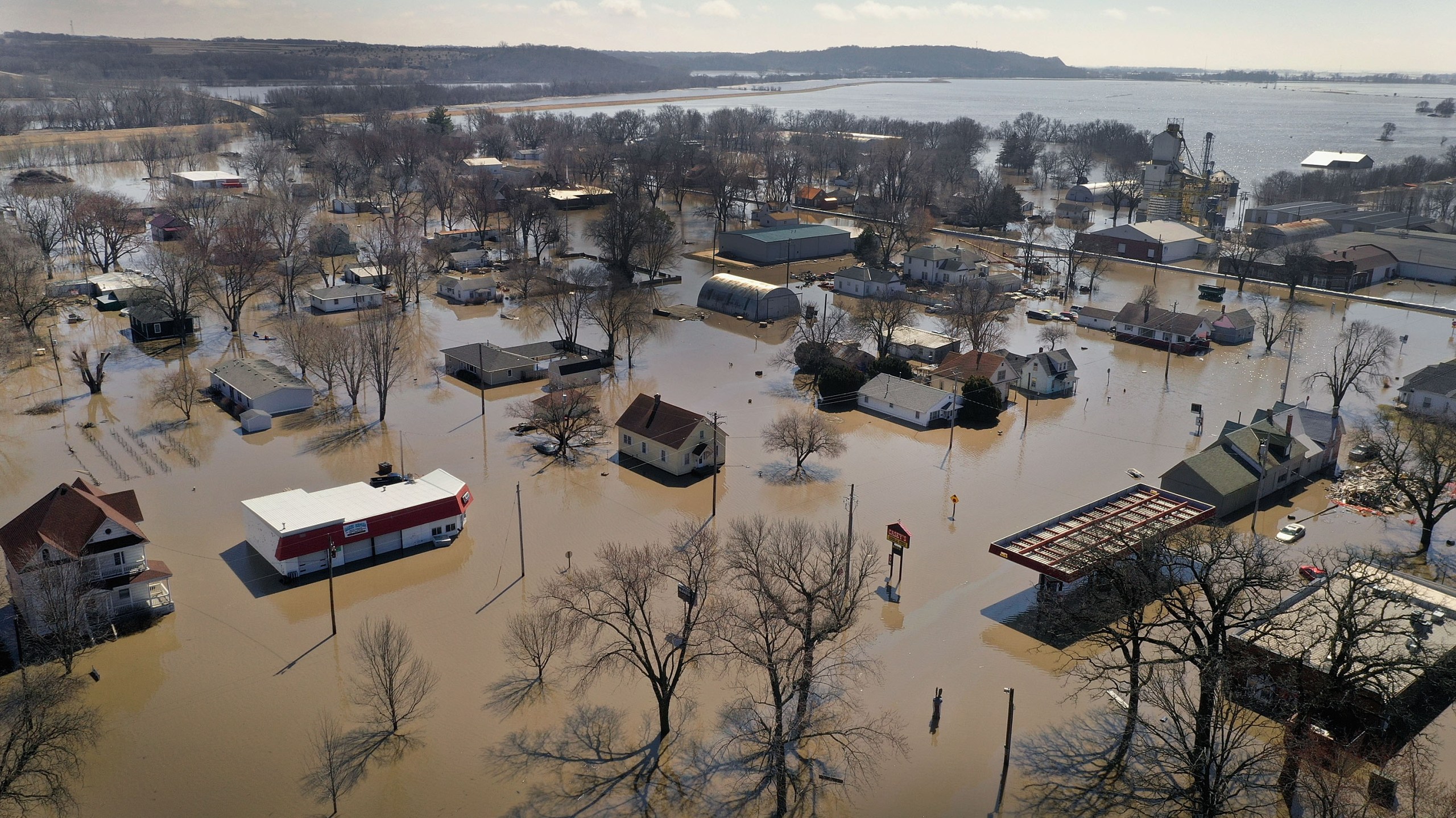 Homes and businesses are surrounded by floodwater on March 20, 2019 in Hamburg, Iowa. (Credit: Scott Olson/Getty Images)