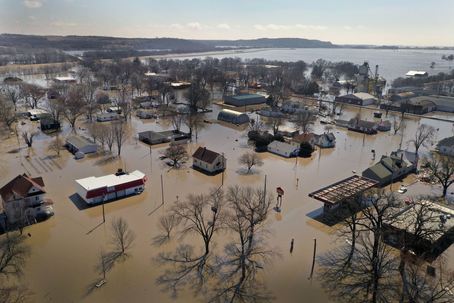 Homes and businesses are surrounded by floodwater on March 20, 2019 in Hamburg, Iowa. (Credit: Scott Olson/Getty Images)