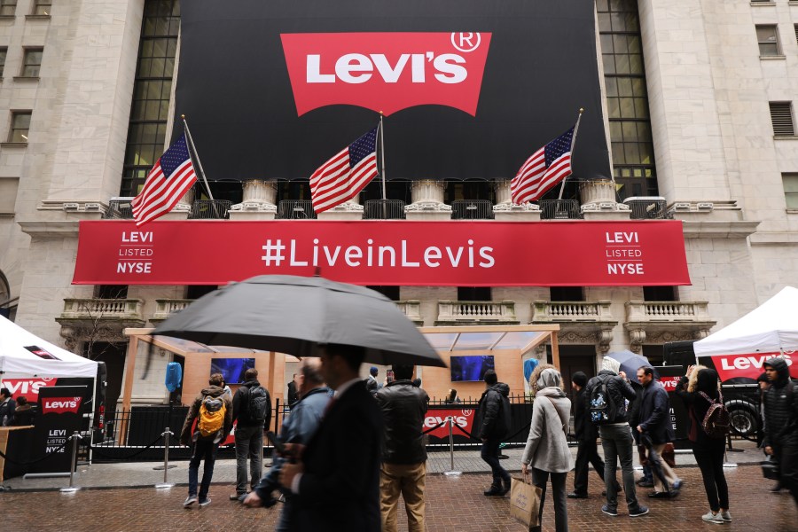 A Levi's banner hangs from the New York Stock Exchange on the day that Levi Strauss has returned to the stock market with an IPO on March 21, 2019 in New York City. (Credit: Spencer Platt/Getty Images)