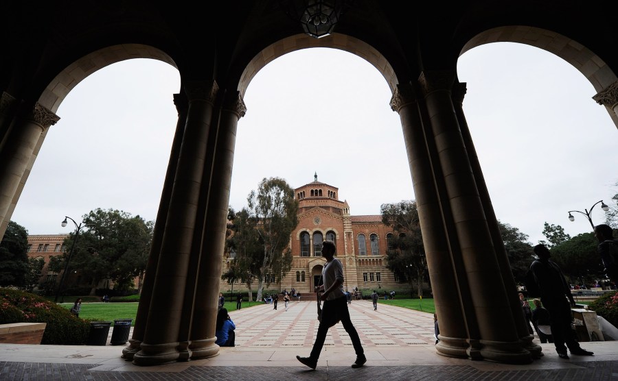 A student walks near Royce Hall on the UCLA campus on April 23, 2012. (Kevork Djansezian/Getty Images)