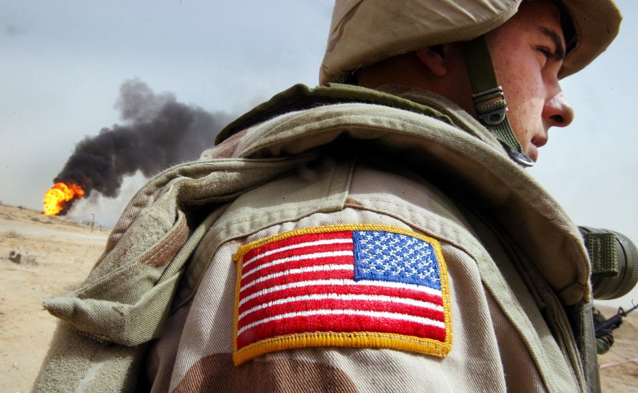 A file photo shows a U.S. flag patch on an American soldier's uniform. (Credit: Mario Tama/Getty Images)