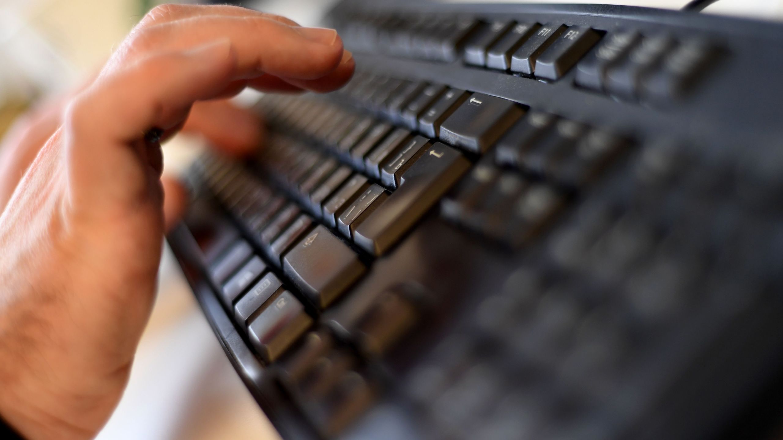 A picture taken on October 17, 2016 shows an employee typing on a computer keyboard at the headquarters of Internet security giant Kaspersky in Moscow. (KIRILL KUDRYAVTSEV/AFP/Getty Images)