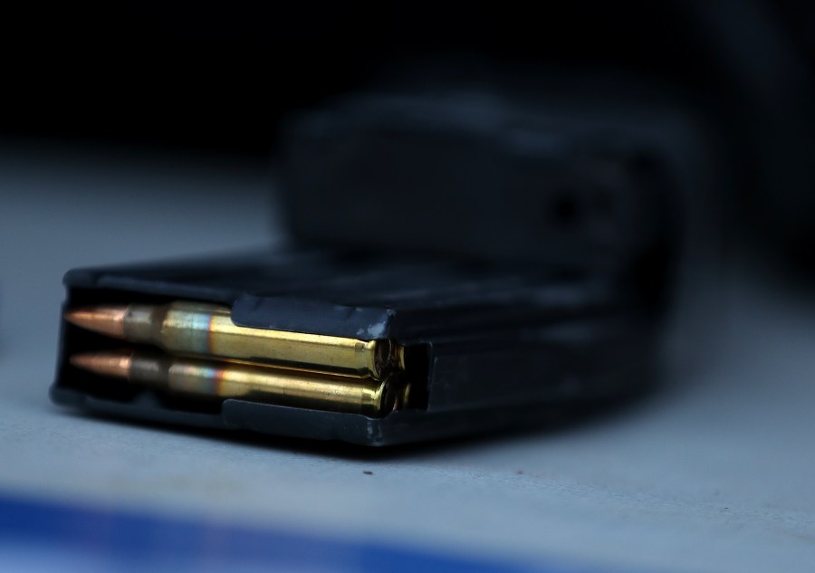 A surrendered assault rifle magazine with bullets sits on a table during a gun buyback event on December 17, 2016 in San Francisco, California. (Credit: Justin Sullivan/Getty Images)