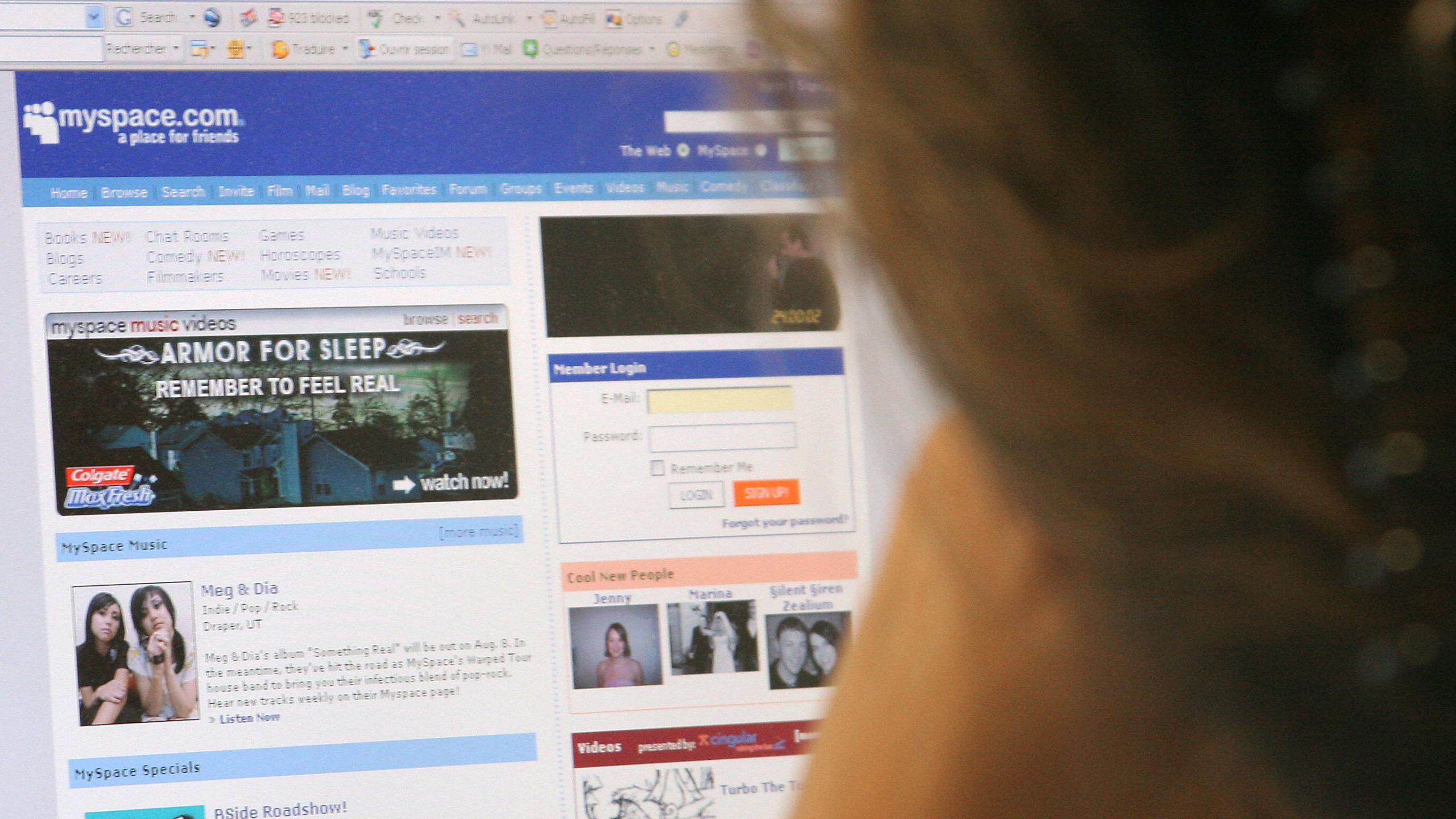 A woman looks at the MySpace website in Washington June 24, 2006. (Credit: NICHOLAS KAMM/AFP/Getty Images)