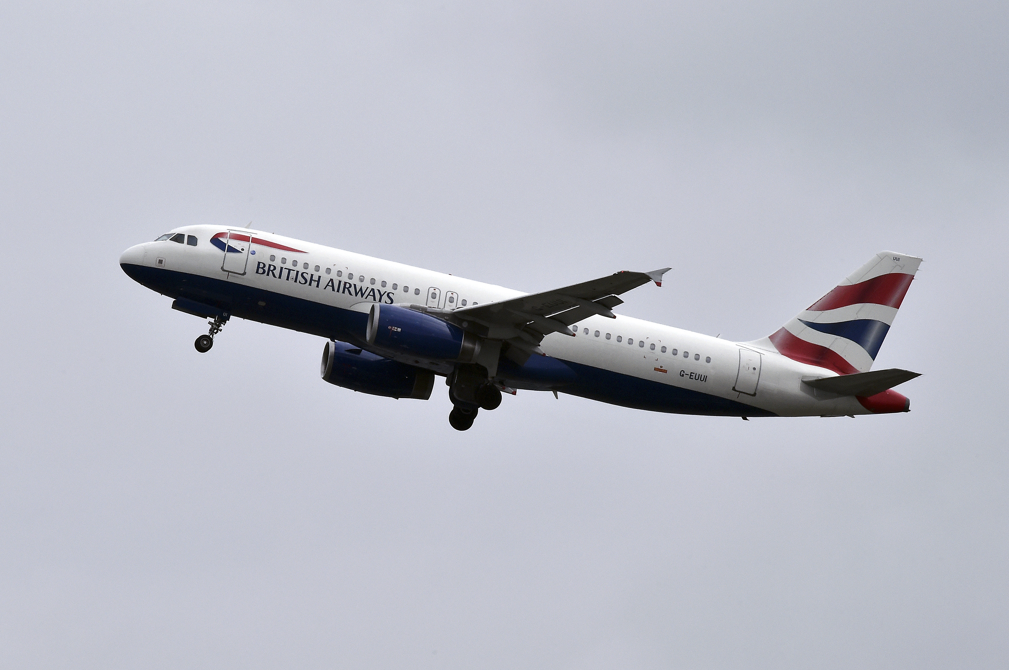 An Airbus A320 of British Airways airline flies after taking off from Toulouse on Oct. 19, 2017. (Credit: Pascal Pavani/AFP/Getty Images)