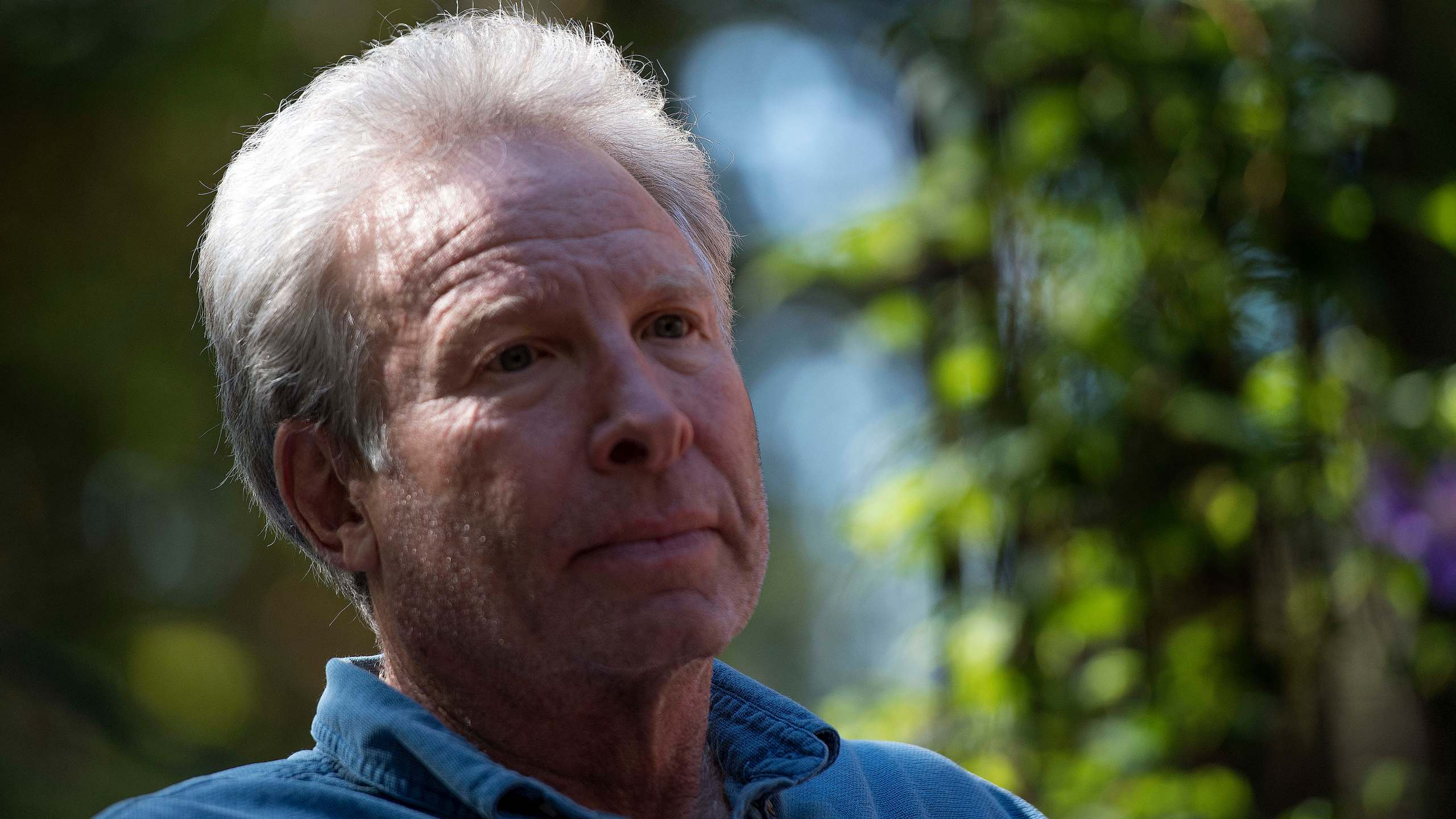 Andy Parker, the father of WDBJ7 TV reporter Alison Parker who was gunned down, along with cameraman Adam Ward, in a horrific shooting aired on live television and social media in 2015, sits on the porch at his home in Collinsville, Virginia, on Oct. 20, 2017. (Credit: JIM WATSON/AFP/Getty Images)