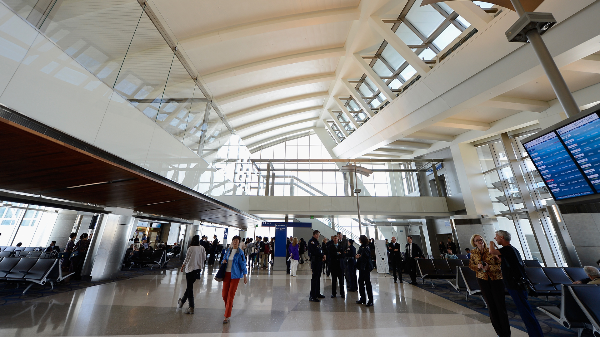 People walk through the north concourse of Tom Bradley International Terminal during its unveiling at Los Angeles International Airport on March 6, 2013. (Credit: Kevork Djansezian/Getty Images)