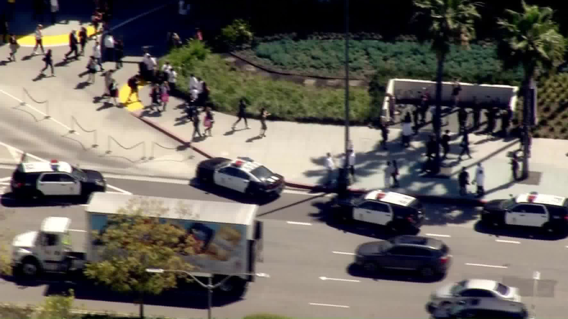 Shoppers leave Westfield Century City after reports of a man with a gun at the mall on March 15, 2019. (Credit: KTLA)