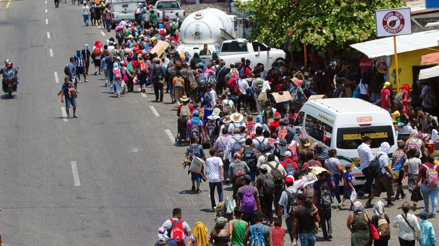 Central American migrants heading in a caravan to the U.S. arrive in Huehuetan, Chiapas state, Mexico, on April 15, 2019. (Credit: PEP COMPANYS/AFP/Getty Images)