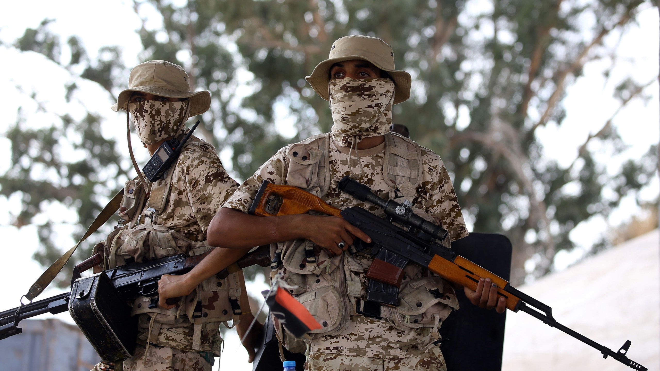 Libyan forces loyal to the Government of National Accord (GNA), Libya's internationally recognised government, keep watch from a position south of the Libyan capital Tripoli on September 25, 2018. (Credit: MAHMUD TURKIA/AFP/Getty Images)