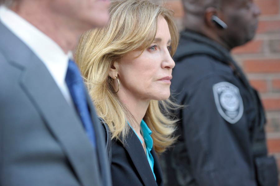 Actress Felicity Huffman exits the John Joseph Moakley United States Courthouse in Boston on April 3, 2019. (Credit: JOSEPH PREZIOSO/AFP/Getty Images)