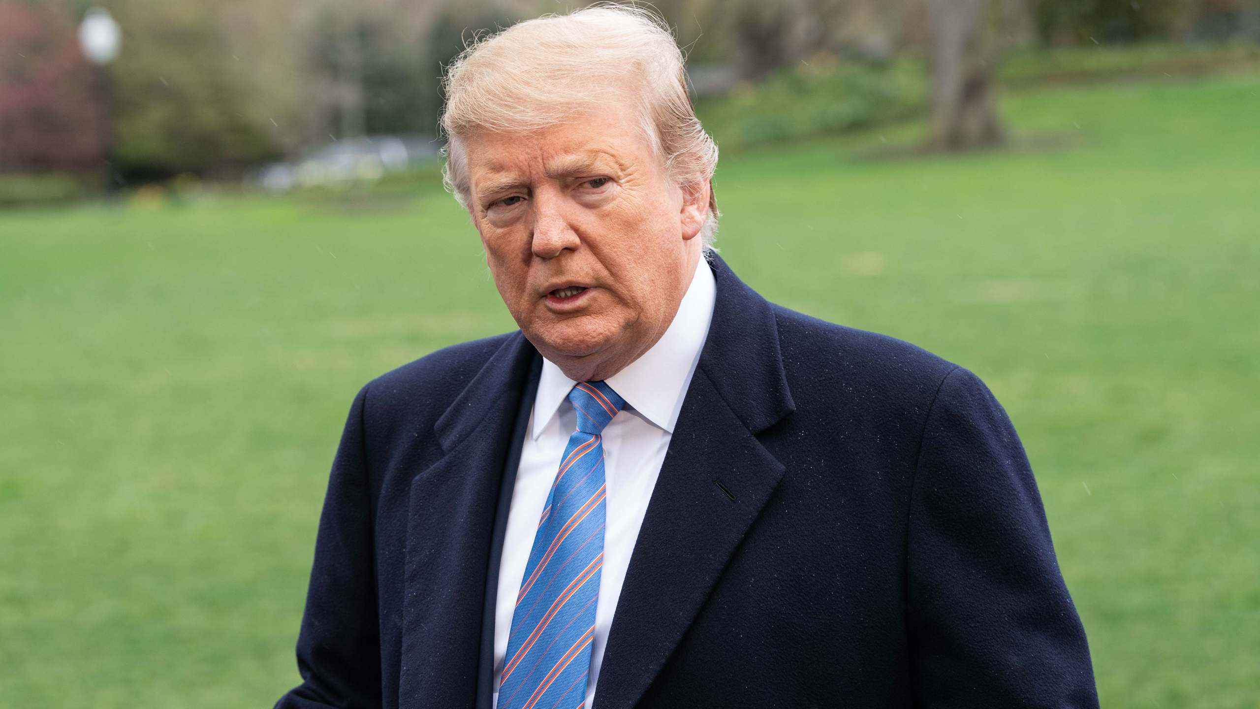 US President Donald Trump speaks to the press as he departs the White House in Washington, DC, on April 5, 2019. (Credit: NICHOLAS KAMM/AFP/Getty Images)