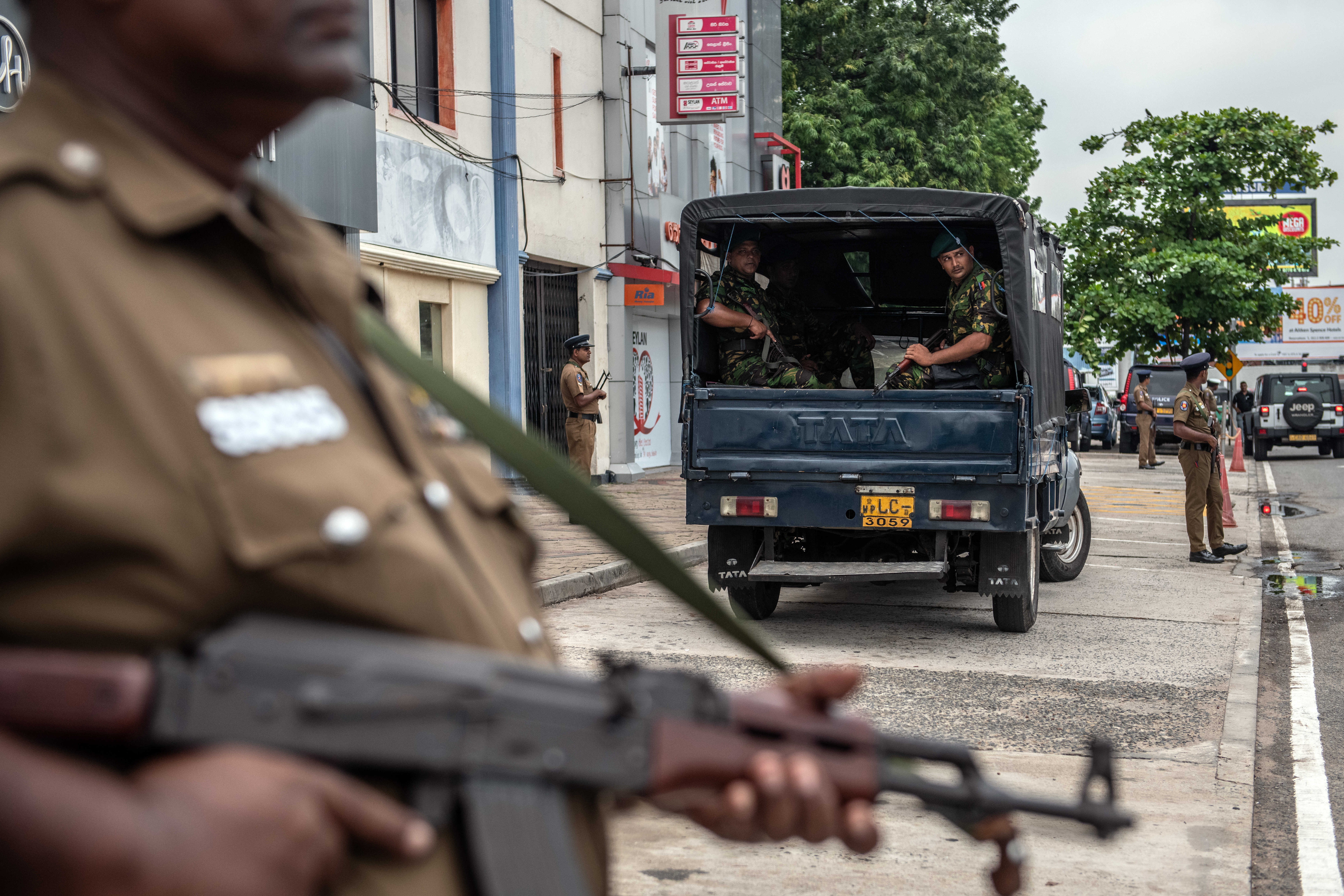 Soldiers and armed police officers guard the area near Dawatagaha Jumma Masjid ahead of Friday prayers on April 26, 2019 in Colombo, Sri Lanka. (Credit: Carl Court/Getty Images)