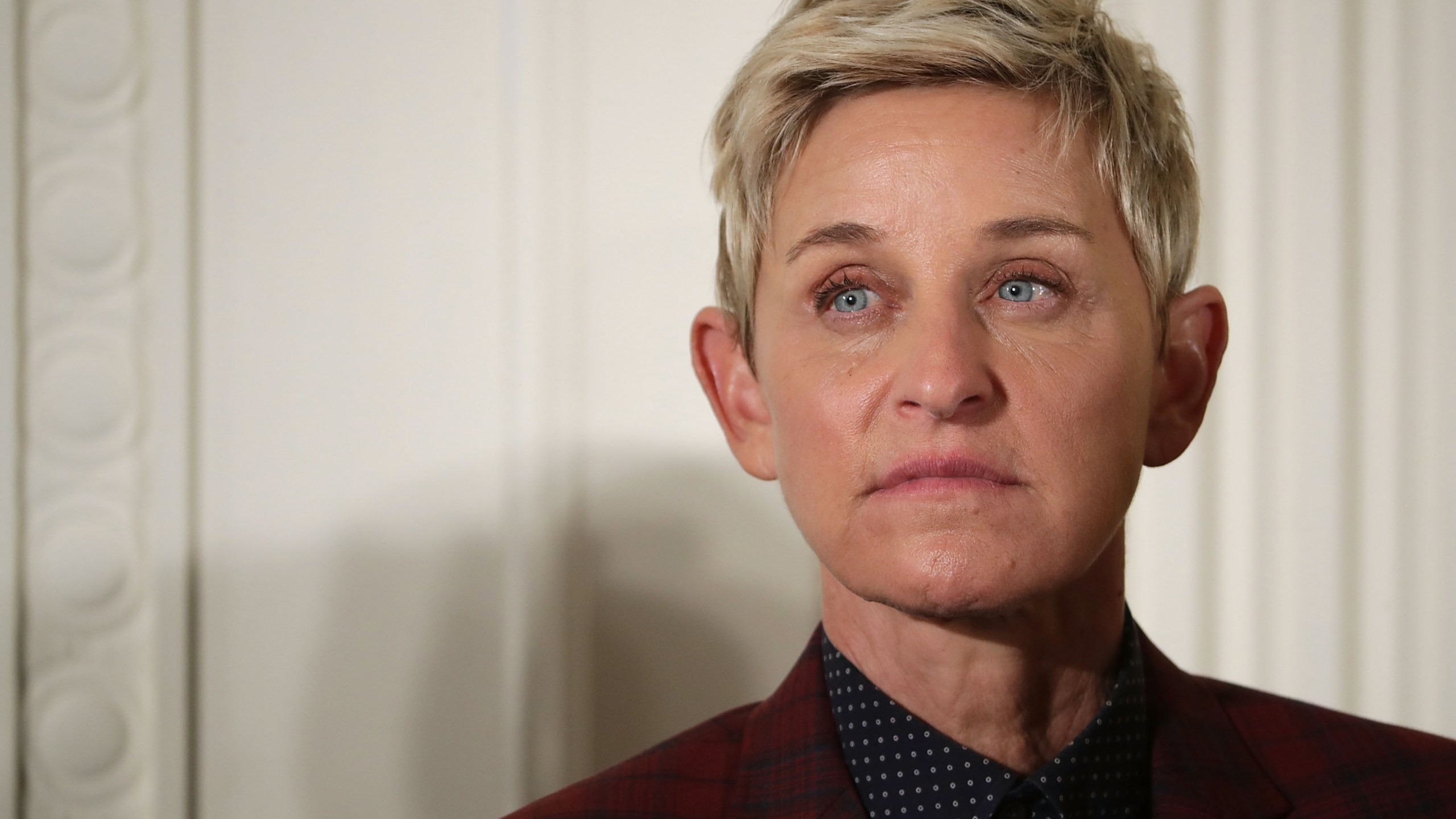 Comedian and talk show host Ellen DeGeneres listens to President Barack Obama before being awarded the Presidential Medal of Freedom during a ceremony in the East Room of the White House Nov. 22, 2016, in Washington, D.C. (Credit: Chip Somodevilla/Getty Images)