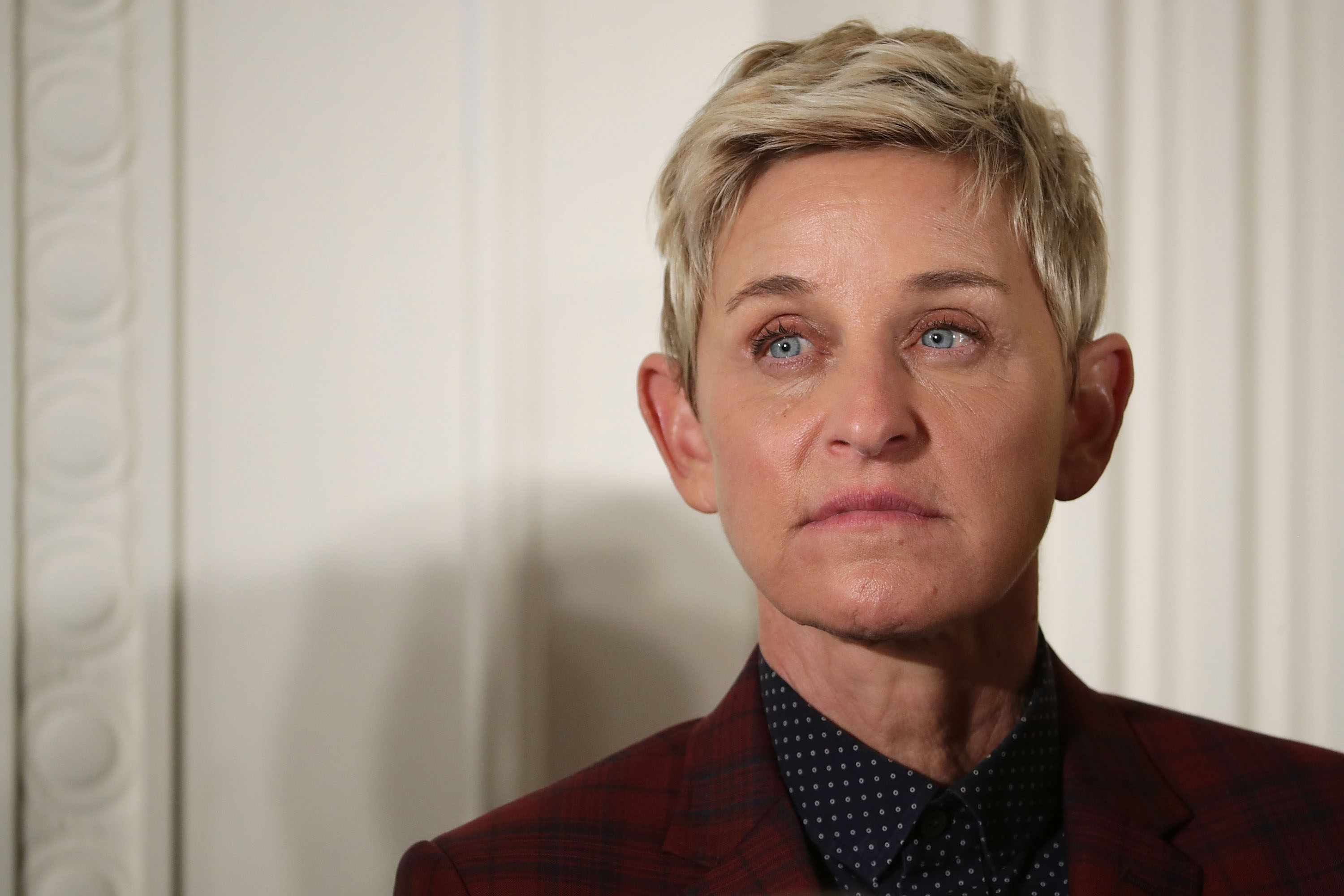 Comedian and talk show host Ellen DeGeneres listens to President Barack Obama before being awarded the Presidential Medal of Freedom during a ceremony in the East Room of the White House Nov. 22, 2016, in Washington, D.C. (Credit: Chip Somodevilla/Getty Images)