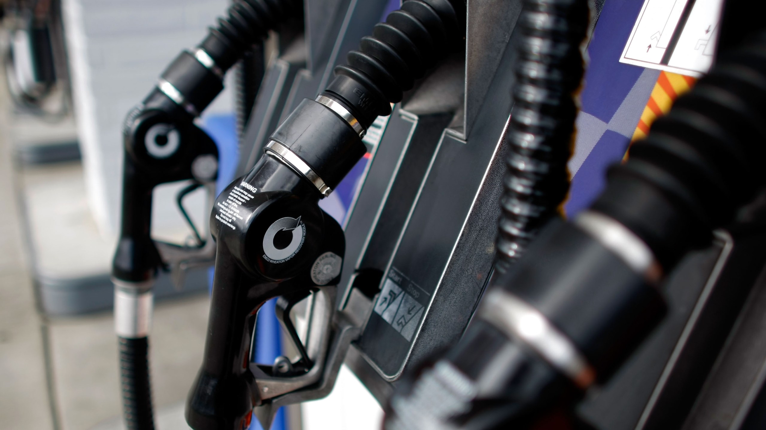 Gas nozzles hang on their pumps at a Union 76 gas station February 22, 2008 in San Rafael. (Credit: Justin Sullivan/Getty Images)