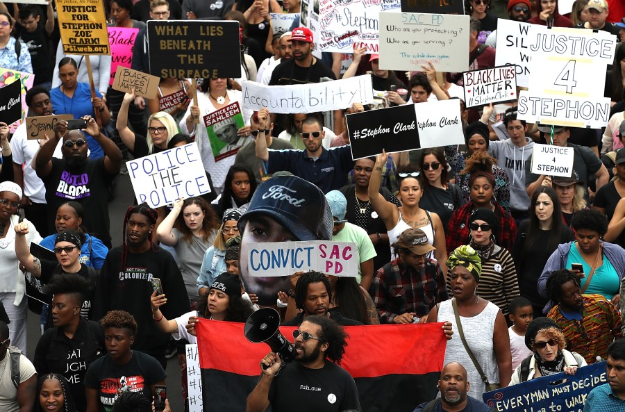 Black Lives Matter protesters take to the streets during a march and demonstration on April 4, 2018 in Sacramento. (Credit: Justin Sullivan/Getty Images)