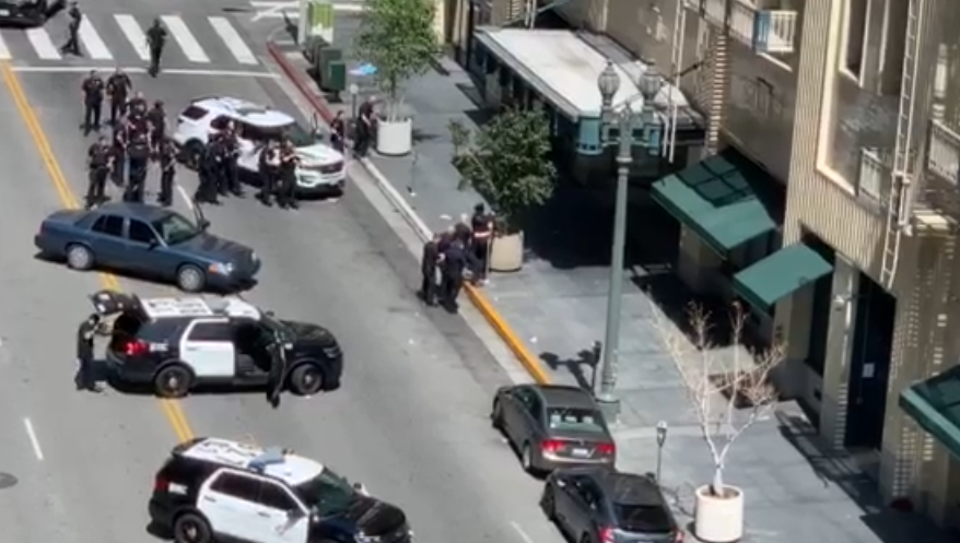 Los Angeles Police Department officers responding to the scene of an officer-involved-shooting in downtown Los Angeles on April 14, 2019. (Credit: Dennis Jaurigue)