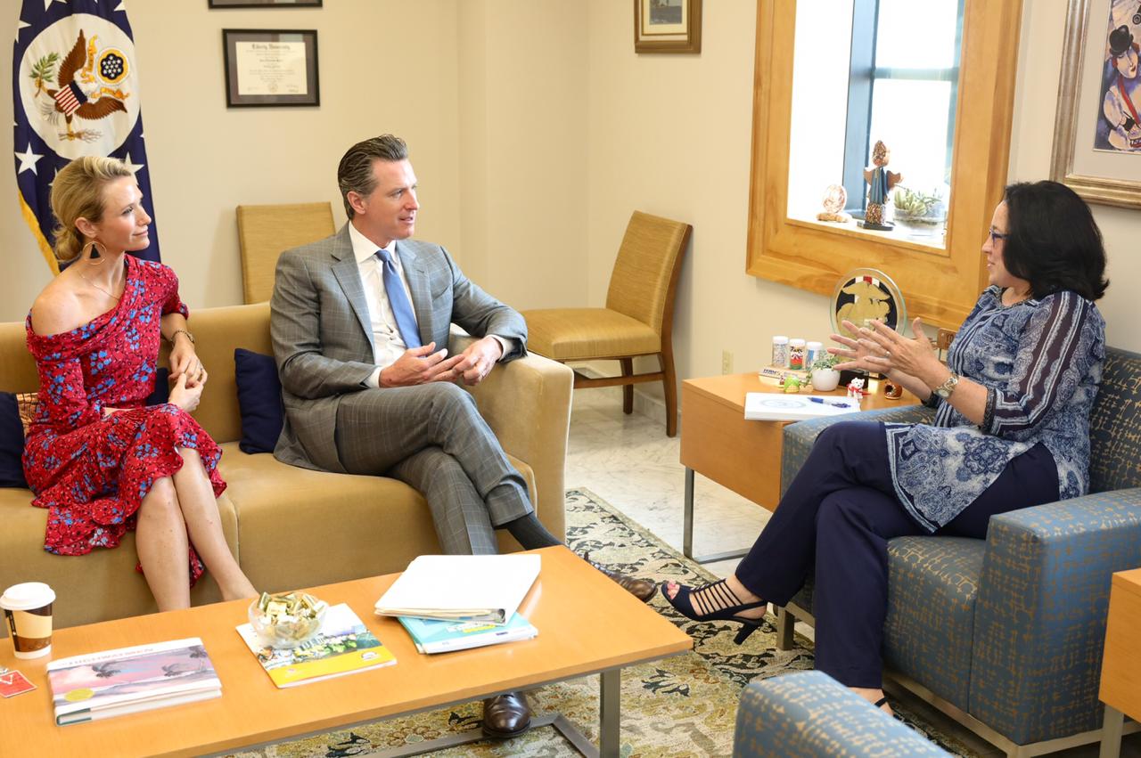 California Gov. Gavin Newsom, center, and his wife, Jennifer Siebel Newsom, left, speaks with U.S. Ambassador to El Salvador Jean Manes in a photo tweeted by the ambassador on April 8, 2019.