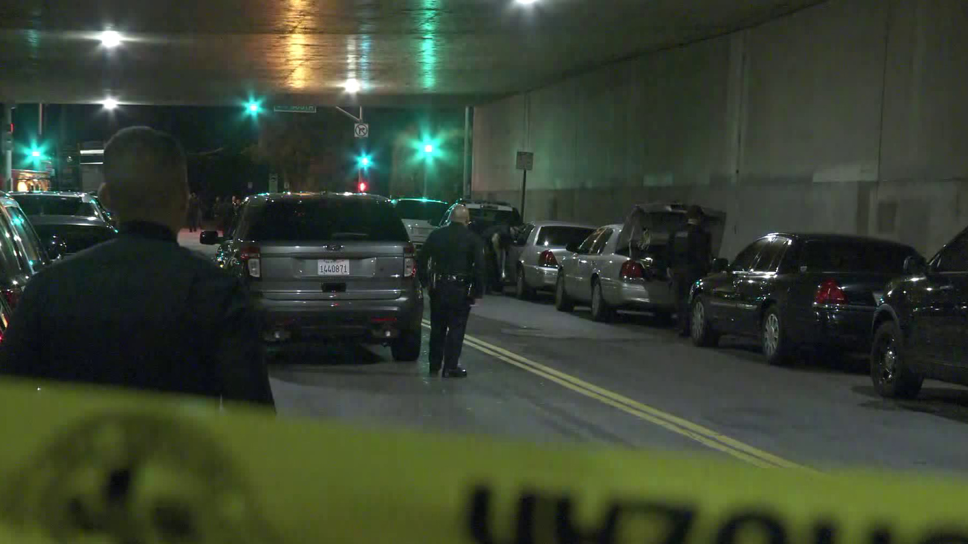 Police officers stand at the scene where an allegedly armed shooting and police pursuit suspect remained barricaded inside a home in Del Rey on May 28, 2019. (Credit: KTLA)