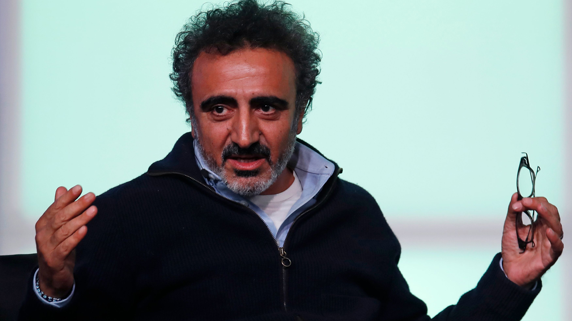 Hamdi Ulukaya, founder of Chobani, speaks at the Obama Foundation Summit in Chicago on November 1, 2017. (Credit: JIM YOUNG/AFP/Getty Images)