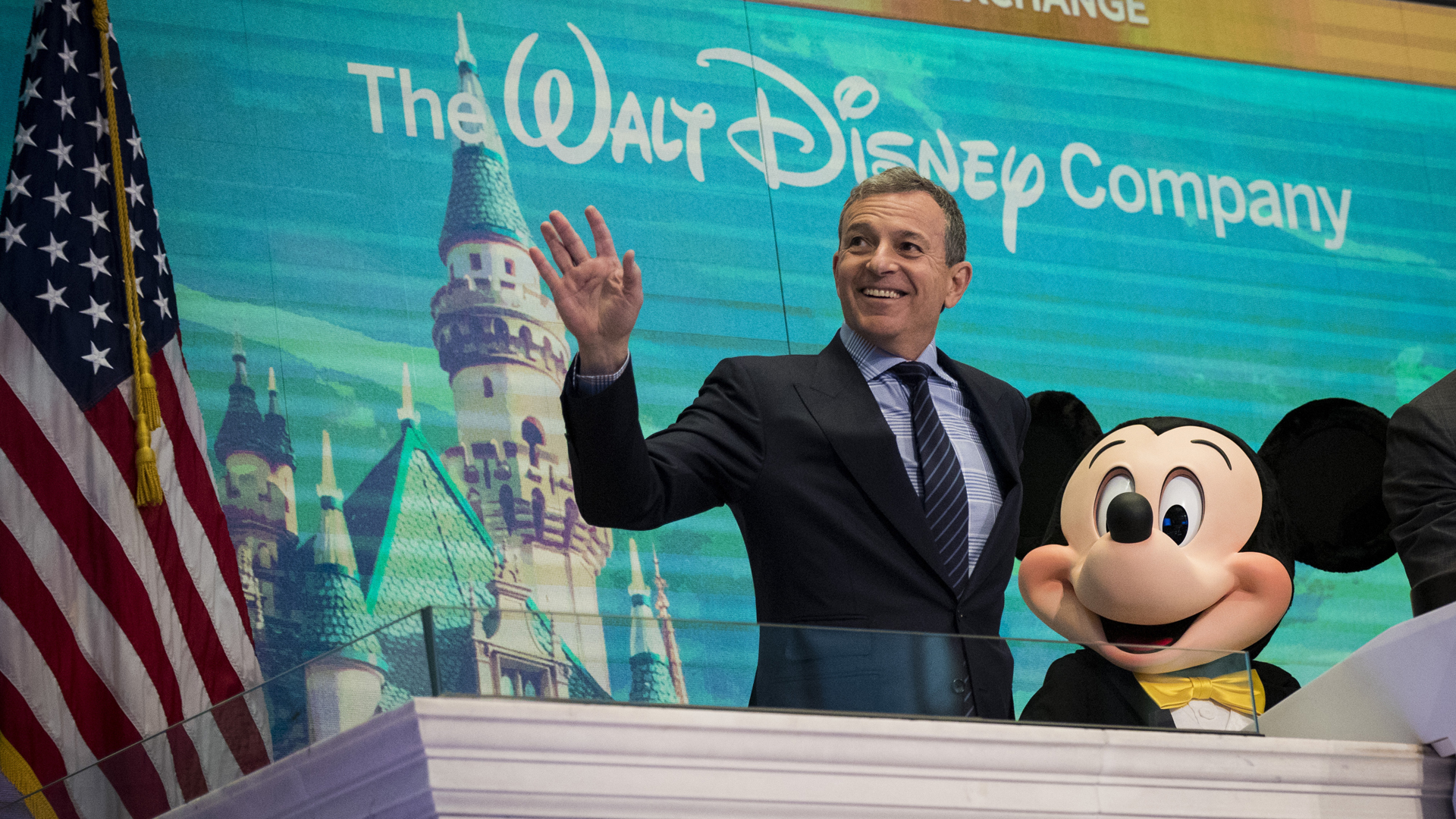 Walt Disney Company CEO Bob Iger and Mickey Mouse look on before ringing the opening bell at the New York Stock Exchange (NYSE), November 27, 2017 in New York City. (Drew Angerer/Getty Images)