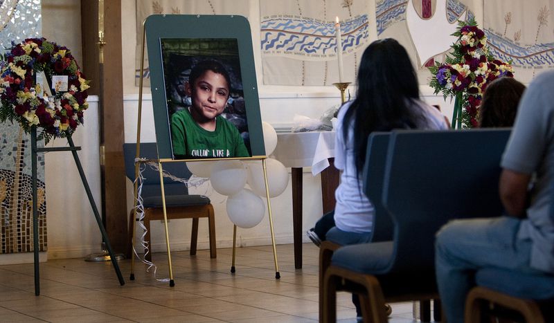 Family and friends attend a memorial service for Gabriel Fernandez, 8, a Palmdale boy who was allegedly beaten to death by his mother's boyfriend in 2013. (Credit: Gina Ferazzi / Los Angeles Times)