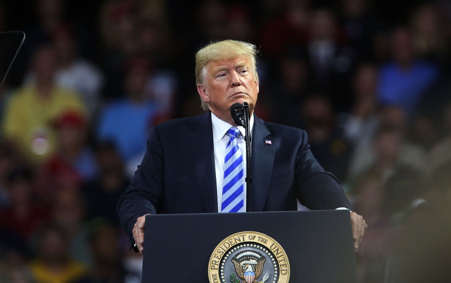 Donald Trump speaks at a rally at the Charleston Civic Center on August 21, 2018 in Charleston, West Virginia. (Credit: Spencer Platt/Getty Images)