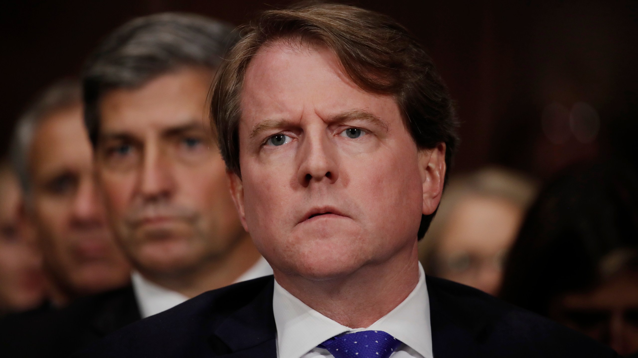 White House counsel Don Mcgahn listens to Judge Brett Kavanaugh testify before the Senate Judiciary Committee during his Supreme Court confirmation hearing in the Dirksen Senate Office Building on Capitol Hill September 27, 2018 in Washington, DC. (Credit: Jim Bourg-Pool/Getty Images)