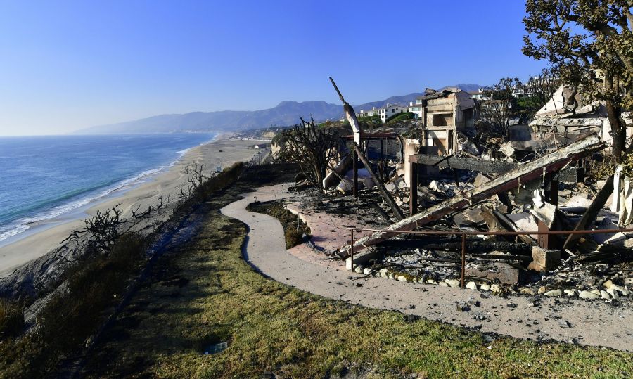 This photo shows the remains of a beachside luxury home along the Pacific Coast Highway community of Point Dume in Malibu on Nov. 11, 2018, as the battle to control the Woolsey Fire continues. (Credit: Frederic J. Brown / AFP / Getty Images)