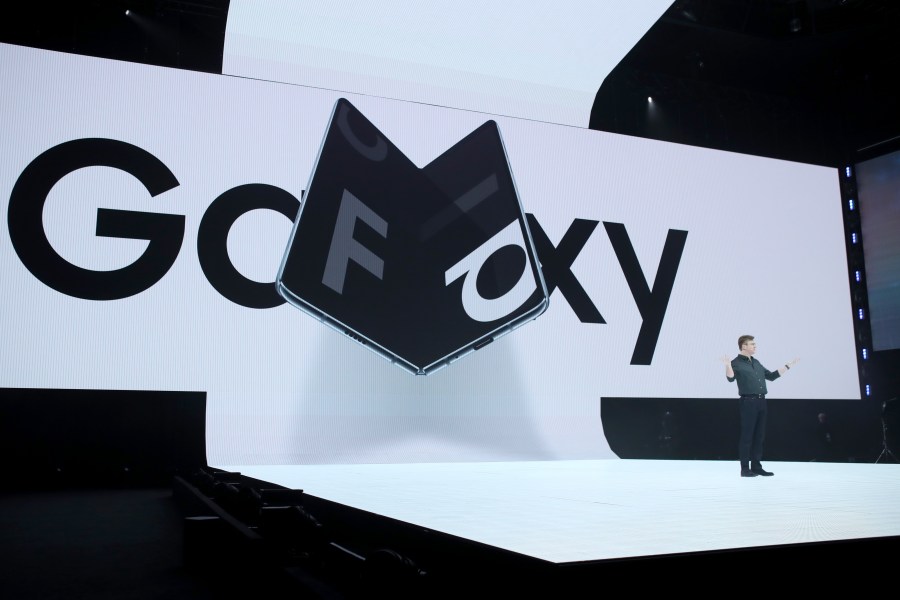 Samsung senior vice president of product marketing Justin Denison announces the new Samsung Galaxy Fold smartphone during the Samsung Unpacked event on February 20, 2019 in San Francisco. (Credit: Justin Sullivan/Getty Images)