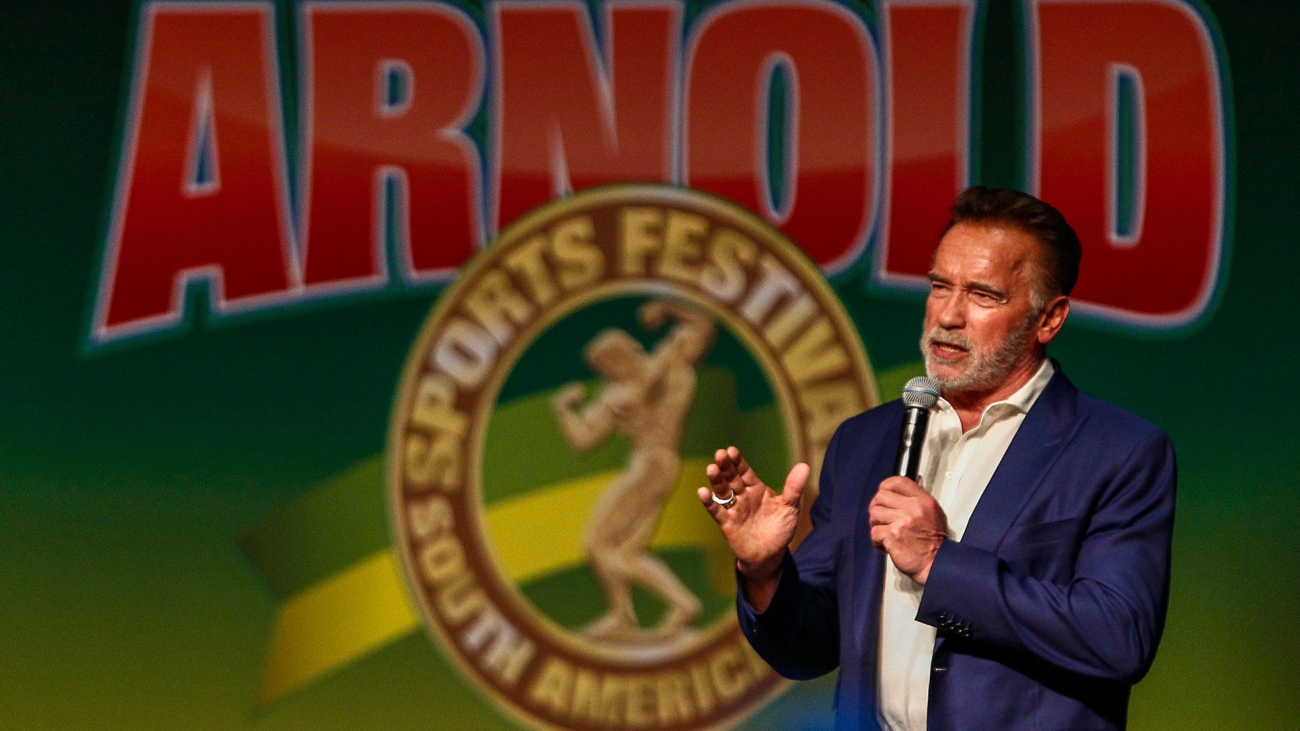 Former California Gov. Arnold Schwarzenegger speaks during the opening of the fitness and bodybuilding Arnold Classic Brazil event in Sao Paulo, Brazil, on April 12, 2019. (Credit: MIGUEL SCHINCARIOL/AFP/Getty Images)