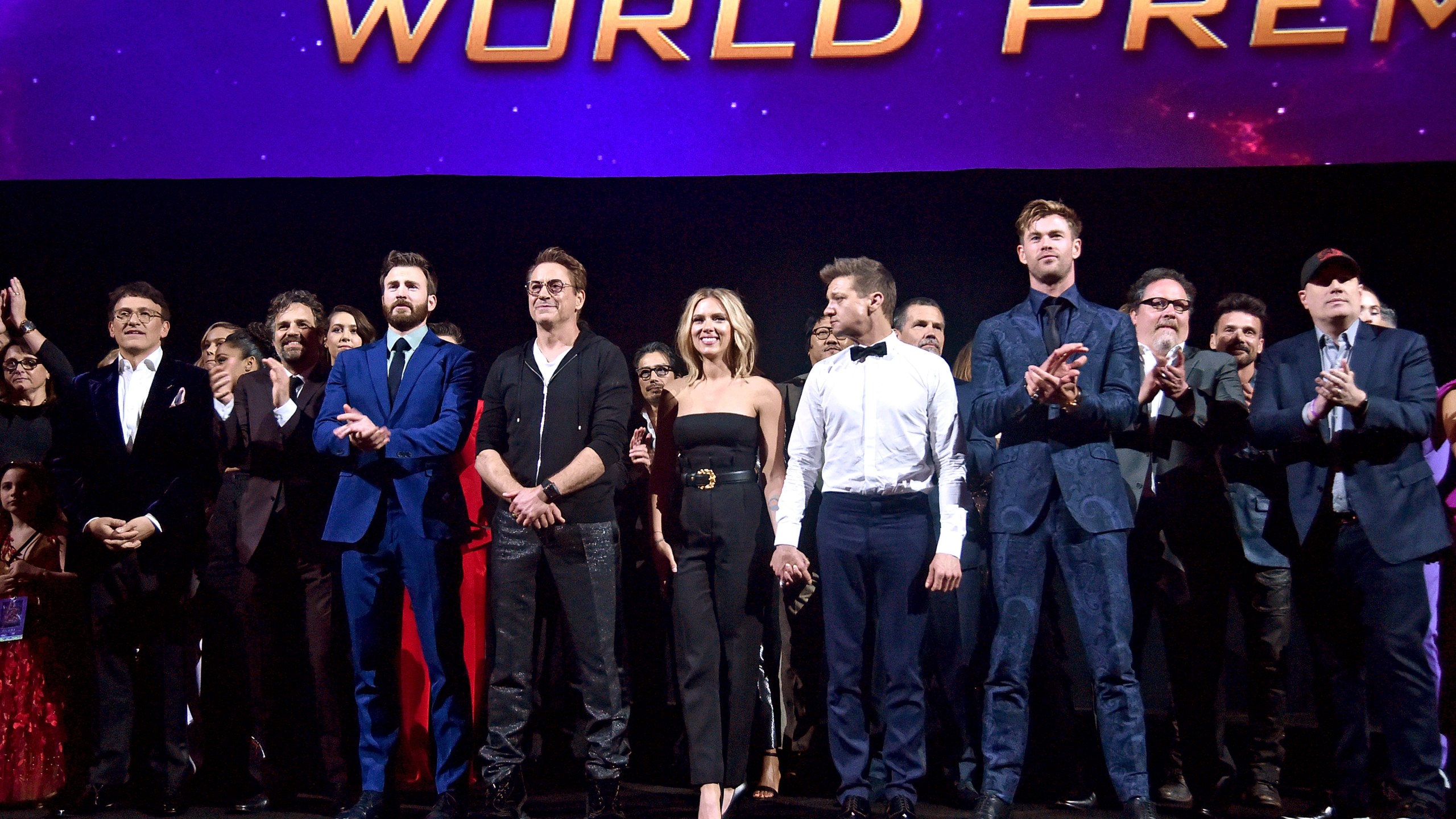 Director Anthony Russo, Mark Ruffalo, Chris Evans, Robert Downey Jr., Scarlett Johansson, Jeremy Renner, Chris Hemsworth, Executive Producer Jon Favreau, and President of Marvel Studios/Producer Kevin Feige speak onstage during the world premiere "Avengers: Endgame" at the Los Angeles Convention Center on April 23, 2019. (Credit: Alberto E. Rodriguez/Getty Images for Disney)