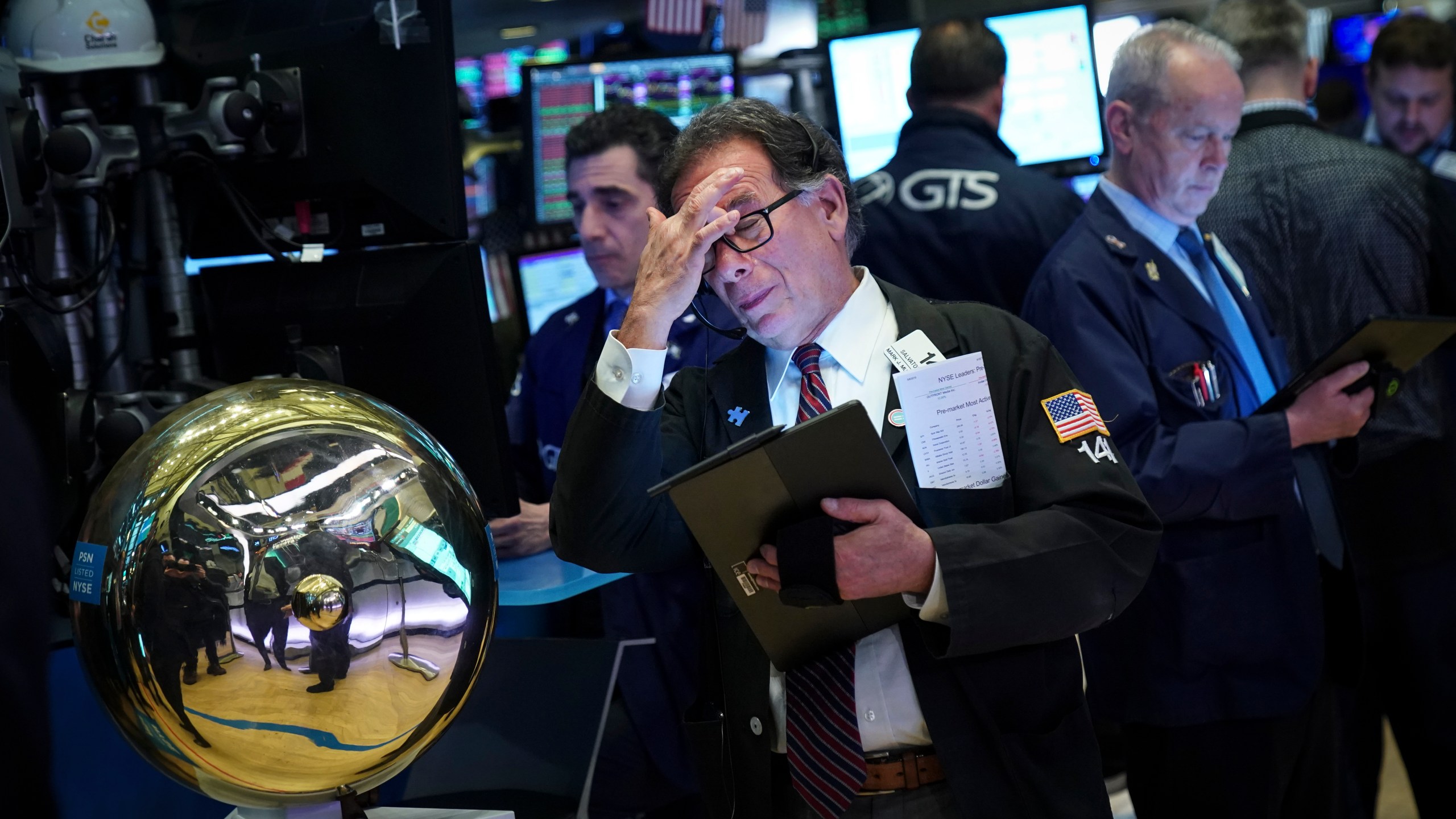 Traders and financial professionals work on the floor of the New York Stock Exchange (NYSE) ahead of the opening bell, May 8, 2019 in New York City. (Credit: Drew Angerer/Getty Images)