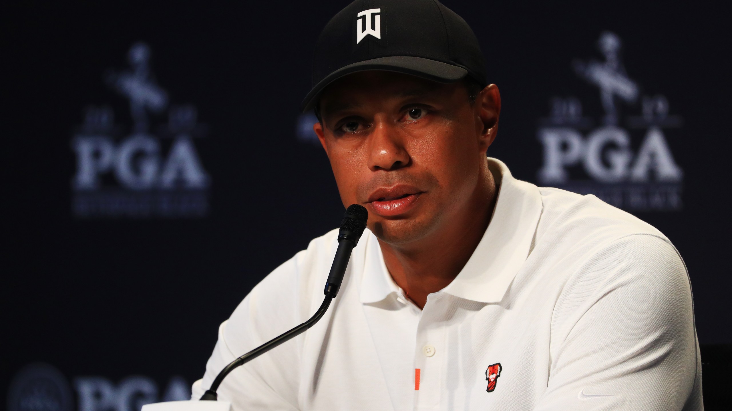 Tiger Woods of the United States speaks to the media during a press conference prior to the 2019 PGA Championship at the Bethpage Black course on May 14, 2019 in Bethpage, New York. (Credit: Mike Ehrmann/Getty Images)