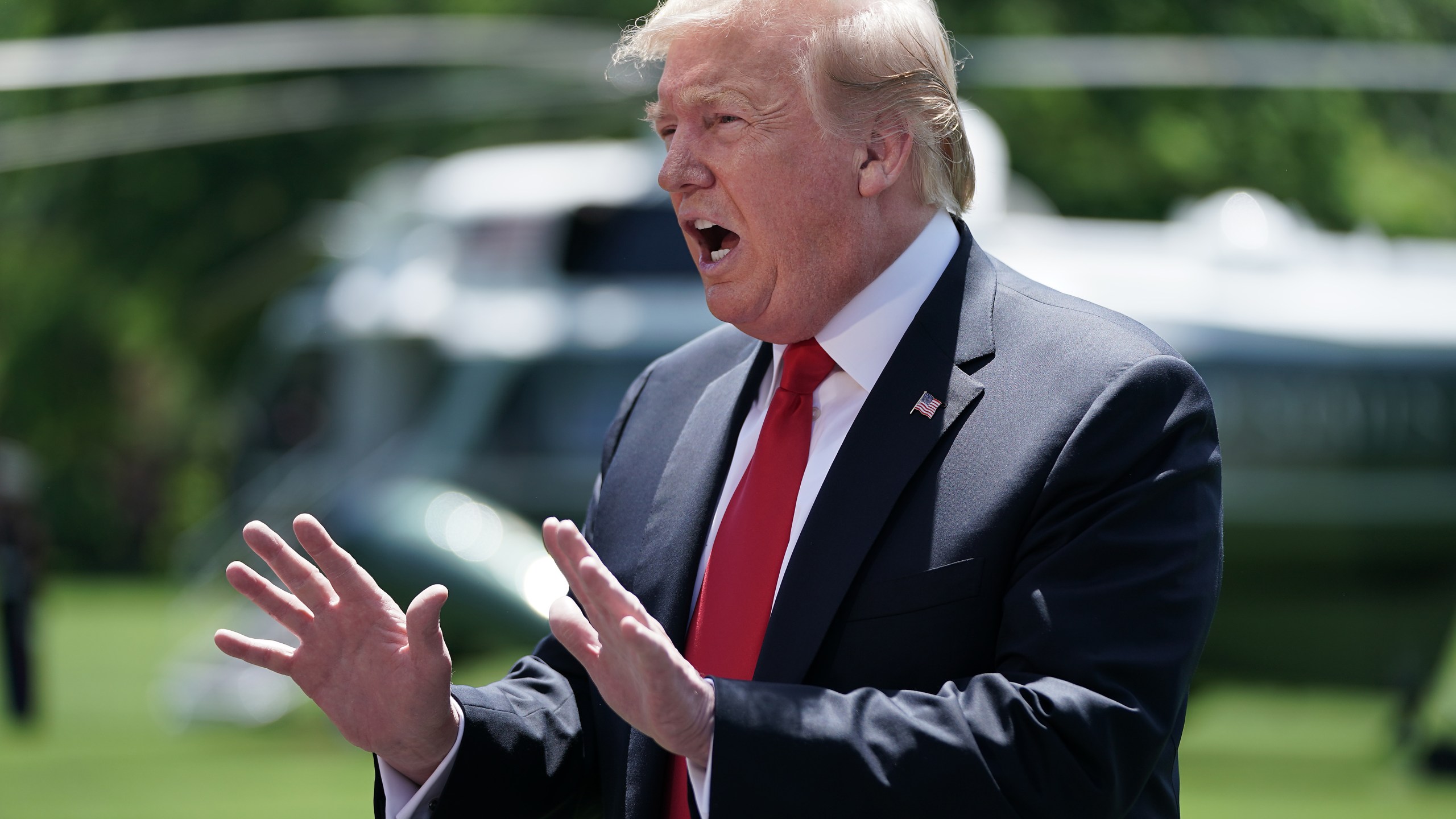 Donald Trump talks to reporters while departing the White House on May 24, 2019. (Credit: Chip Somodevilla/Getty Images)