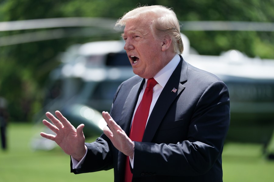 Donald Trump talks to reporters while departing the White House on May 24, 2019. (Credit: Chip Somodevilla/Getty Images)