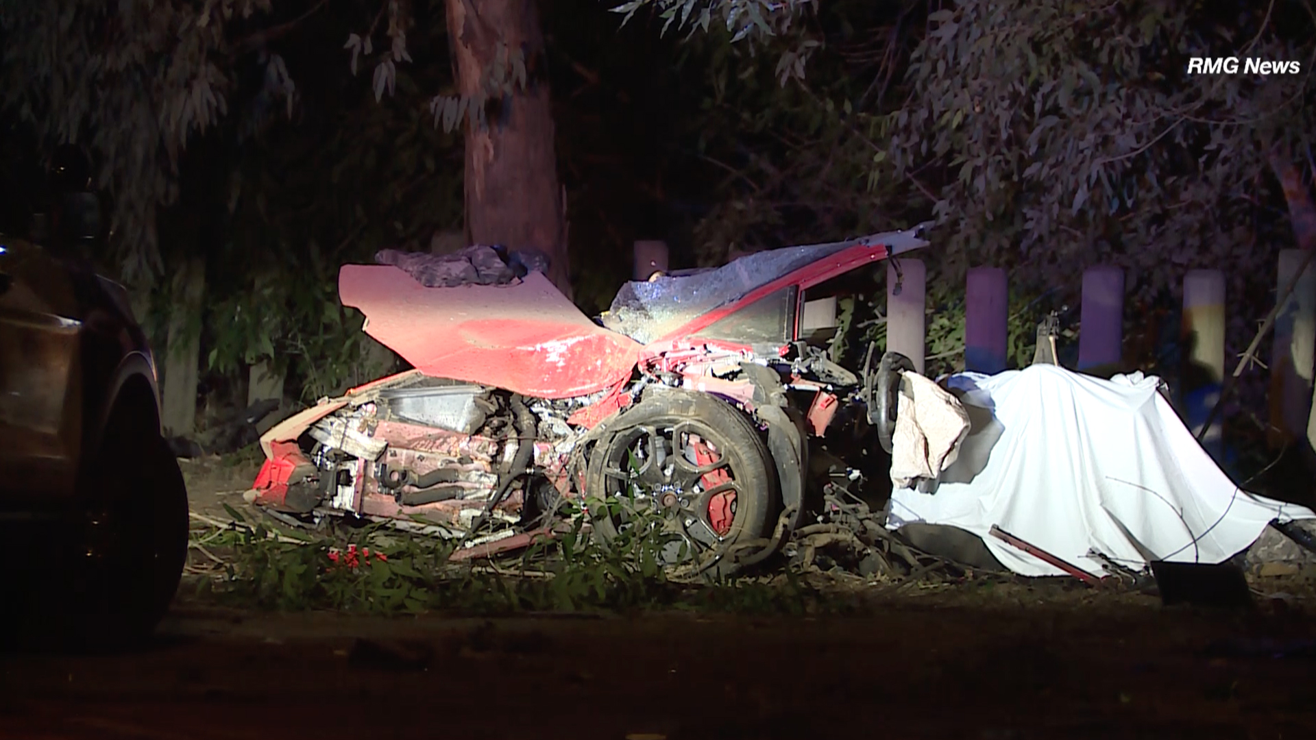 Authorities investigate the scene of a sports car crash that left two people dead in the Sepulveda Basin on May 15, 2019. (Credit: RMG News)