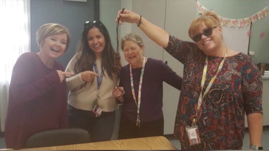 Four Summerwind Elementary School teachers are seen holding a noose in a photo that circulated on social media.