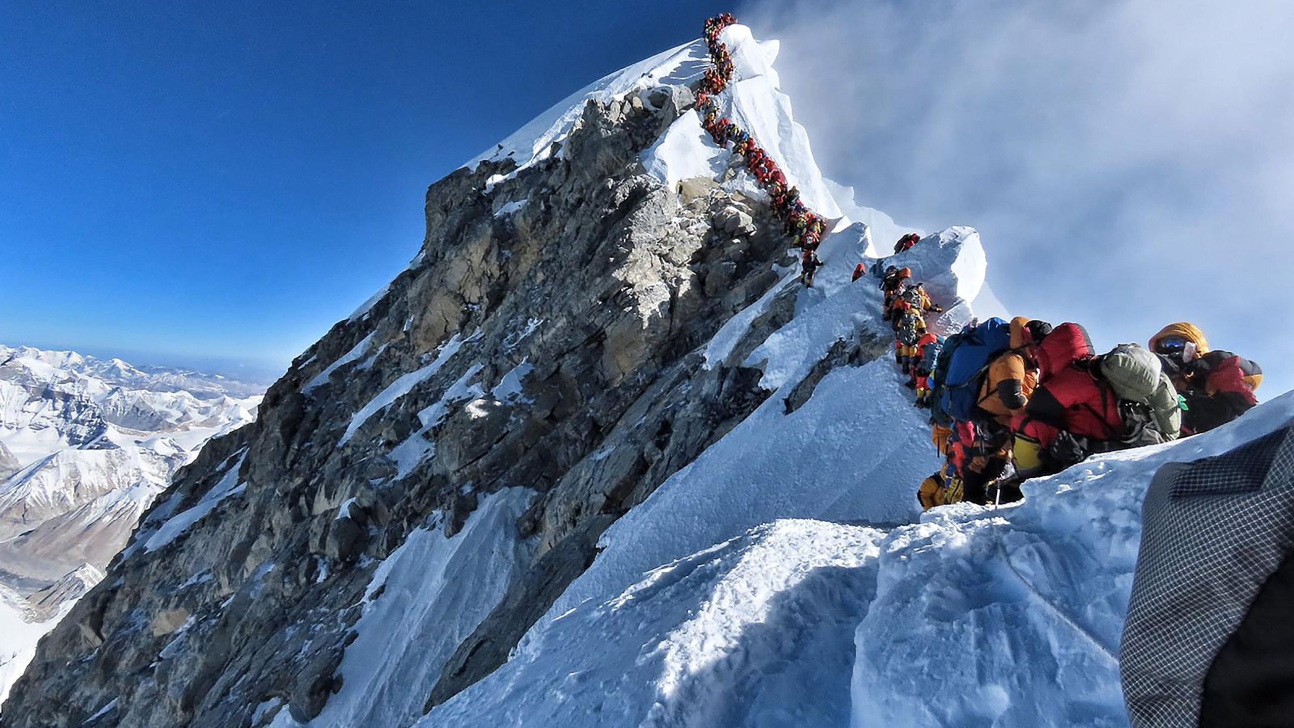 Climbers wait to reach the summit of Everest in this image taken May 22. (Credit: Project Possible/Getty Images via CNN)