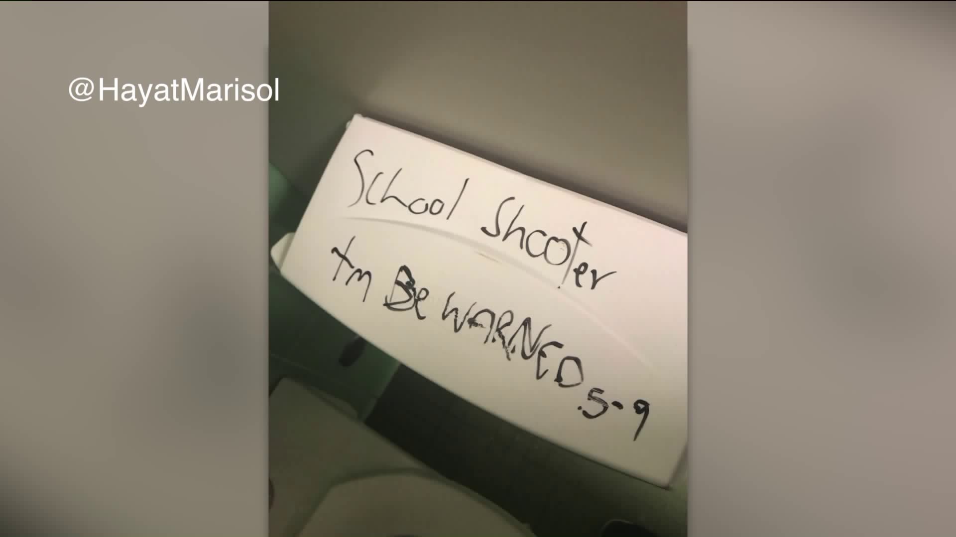 A threat is written inside a bathroom on the campus of California State University Long Beach. (Credit: @HayatMarisol on Twitter)