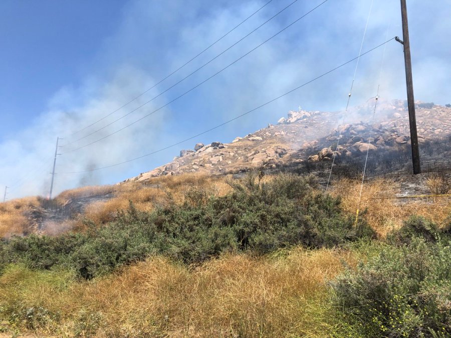 Smoke rises from a small brush fire burning at Mt. Rubidoux in Riverside on June 8, 2019. (Credit: Riverside Police Department)