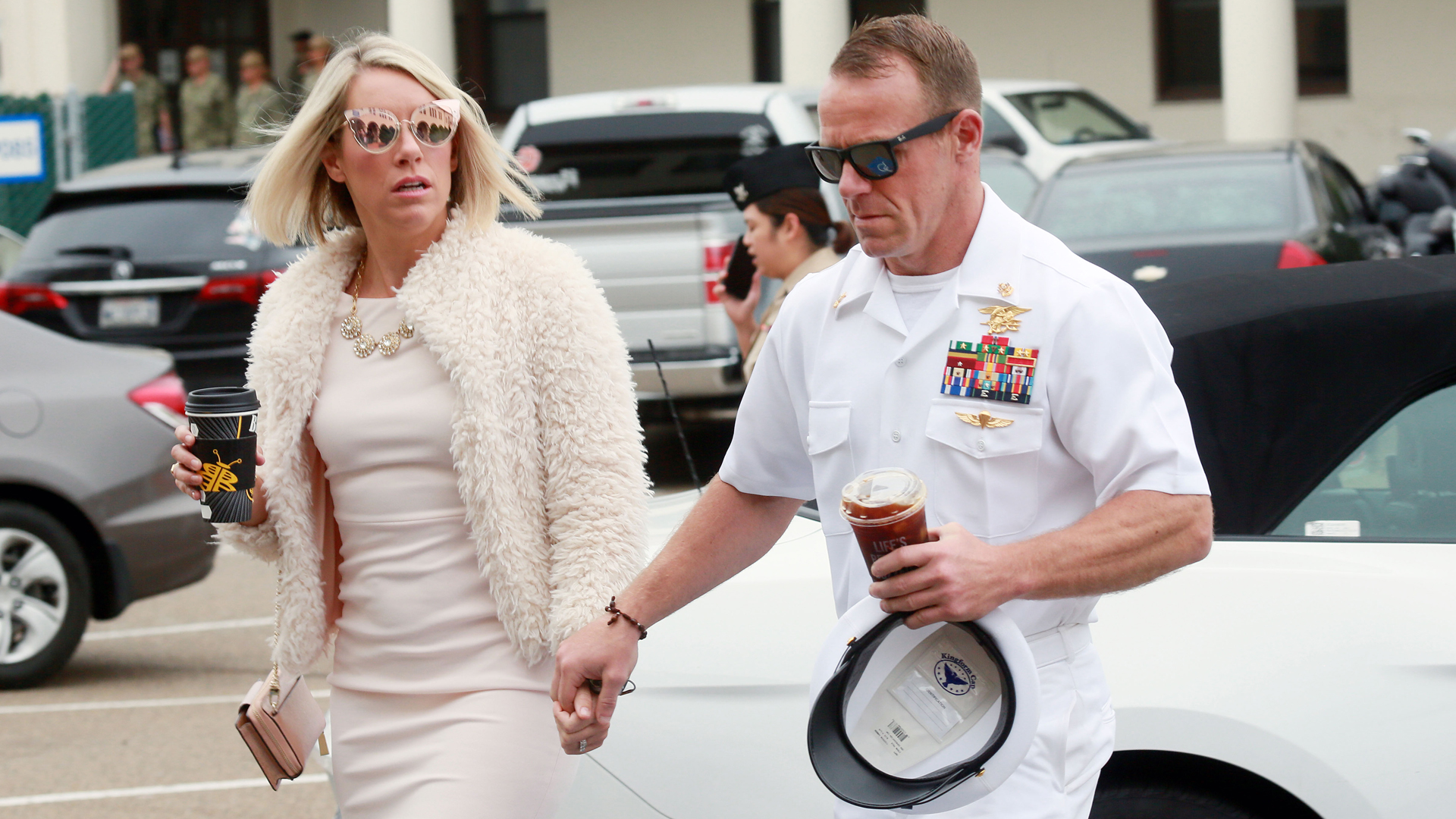 Navy Special Operations Chief Edward Gallagher walks into military court with his wife Andrea Gallagher June 24, 2019, in San Diego, California. (Credit: Sandy Huffaker/Getty Images)