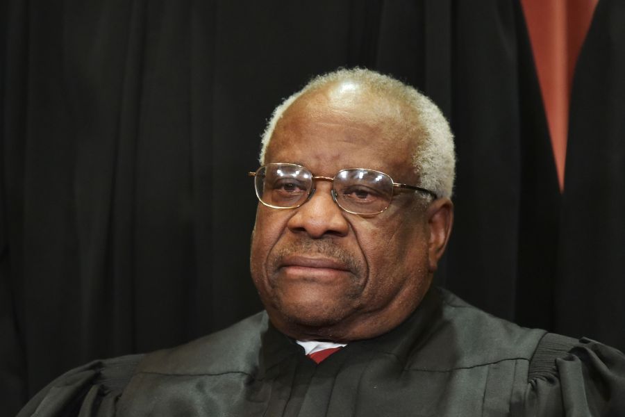 Justice Clarence Thomas poses for the official group photo at the Supreme Court in Washington, DC on November 30, 2018. (Credit: MANDEL NGAN/AFP/Getty Images)