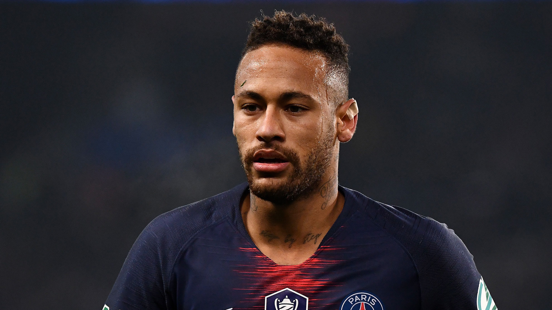 Paris Saint-Germain's Brazilian forward Neymar looks on during the French Cup round of 32 football match between Paris Saint-Germain (PSG) and Strasbourg (RCS) at the Parc des Princes stadium in Paris on January 23, 2019. (Credit: FRANCK FIFE/AFP/Getty Images)